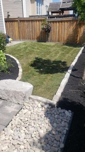 103 - Stone garden edging, riverstone, sod