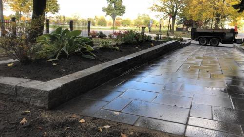 108 - Comercial stone garden wall installation