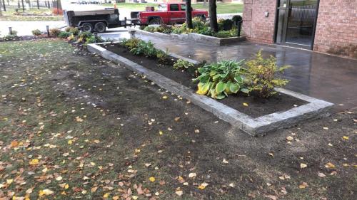 109 - Comercial stone garden wall installation