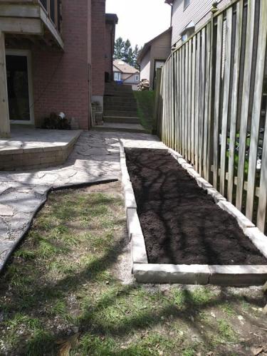 11 - Backyard garden with ledger rock