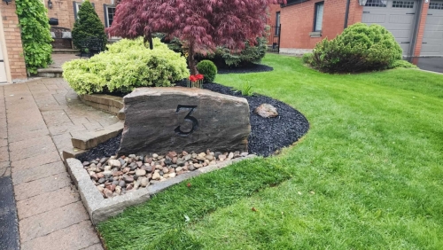 2025-Whitby-Landscaping-Gardening-18-Large-stone-front-garden