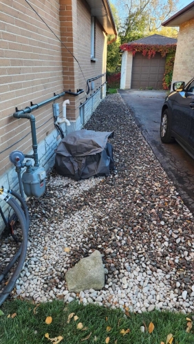 2025-Whitby-Landscaping-Gardening-37-River-stone-Gravel-side-yard