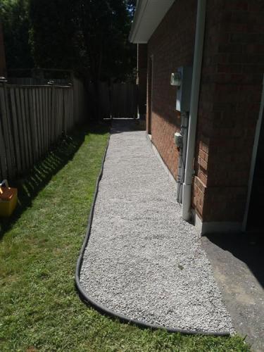 32 - Side walkway pea stone