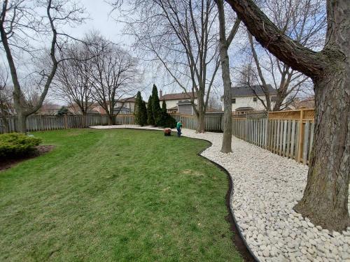 3 - Backyard with river stone garden