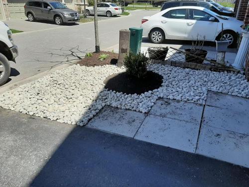 69 - River stone lawn replacement