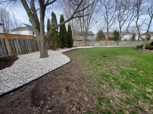 6 - Backyard with river stone garden