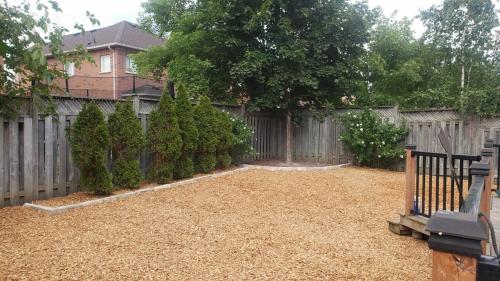 99 - Backyard playground mulch and fabric