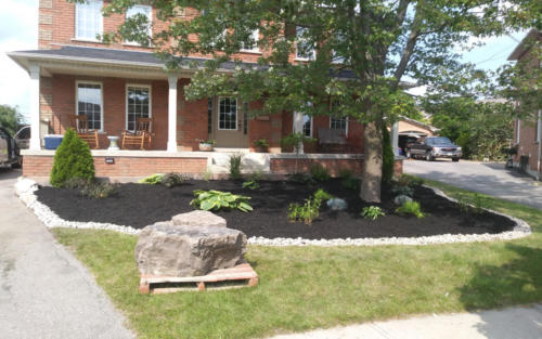 front garden bed design with river stone edge 1 