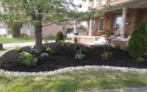front garden bed design with river stone edge 2 