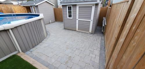 13- Backyard Interlock Around Pool
