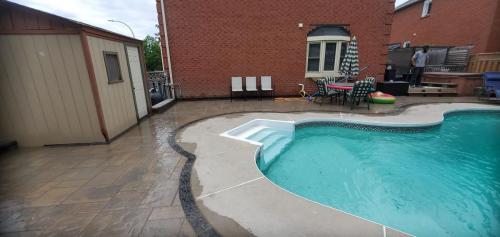 17 - Backyard Pool Unilock Beacon Hill