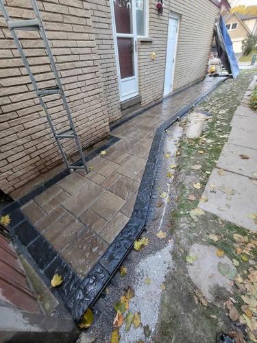 2021-Interlock-leading-to-side-entrance-at-duplex-in-Whitby-Techo-Bloc-Blu-60-Chestnut-brown-textured