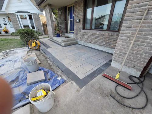 2021-b4-During-modern-front-patio-and-path-install-matching-backyard-patio-Whitby-Unilock-Beacon-Hill-Granite-Mist-Smooth
