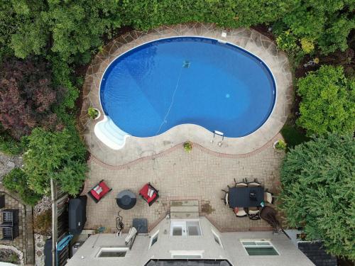 2021-c1-Before-hardscaping-overhaul-around-pool-in-Ajax