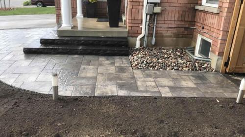 2021-h4-Side-of-home-interlock-two-steps-new-garden-bed-and-riverstone-barrier-beside-house-in-Whitby-Unilock-Beacon-Hill-Granite-fusion-with-wrap-around-steps