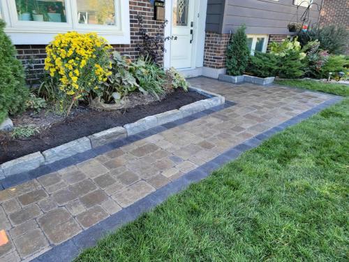 2021-n1-Replacement-interlock-path-and-natural-stone-garden-wall-in-Whitby-Unilock-Brussels-Sierra-with-Midnight-Charcoal-border