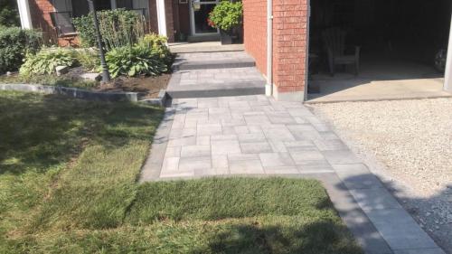 2021-p2-Finished-new-interlock-path-and-steps-without-border-beside-home-new-sod-Bestway-Trevista-50-grey-mix-with-Unilock-Sienna-Smooth-Step