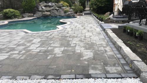 2021-q3-Replacement-of-large-interlock-patio-around-pool-Pickering-Oaks-Rialto-Marble-Grey