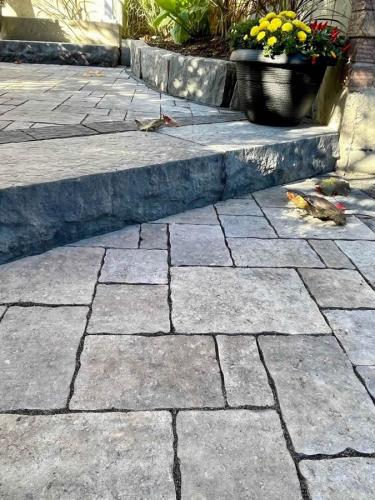 2021-r2-Walkway-replacement-levelling-and-onyx-steps-with-natural-stone-garden-wall-in-Whitby-Unilock-Windermere-Granite-Blend-Bestway-Camden-Step-Ultra-Black