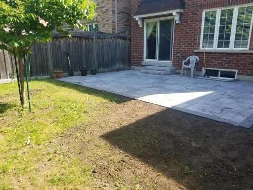 2021-s2-Small-patio-with-border-two-stone-steps-in-backyard-in-Whitby-topsoil-and-overseeding-of-lawn-Unilock-Beacon-Hill-Granite-Fusion