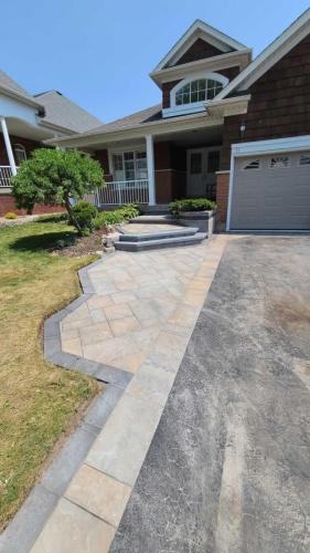 2024-Whitby-Landscaping-Landscaping-22-Elegant-Front-Walkway