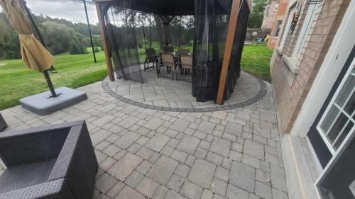 2024-Whitby-Landscaping-Landscaping-27-Circular-Interlock-Pad