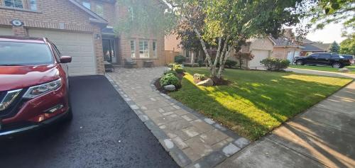 31 - Front Entrance Including Gardens  Sod