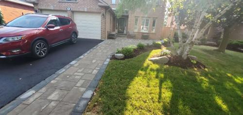 32 - Front Entrance Including Gardens  Sod