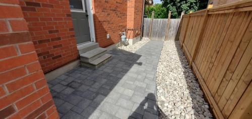 40 - Sideyard installation with River stone