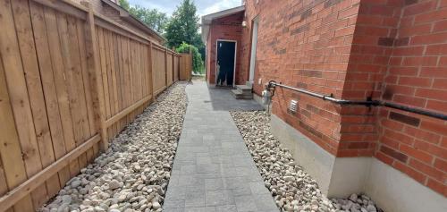 41 - Sideyard installation with River stone