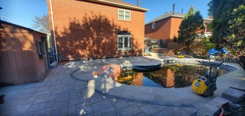 51 - Backyard Pool Oasis with Unilock Beacon Hill Whitby