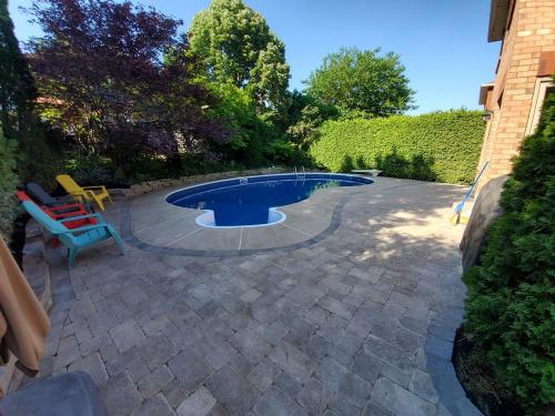 7 - Backyard Unilock Patio Pool