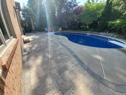 8 - Backyard Unilock Patio Pool