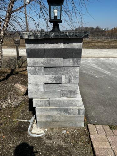 2025-Whitby-Landscaping-Post-Repair-Before