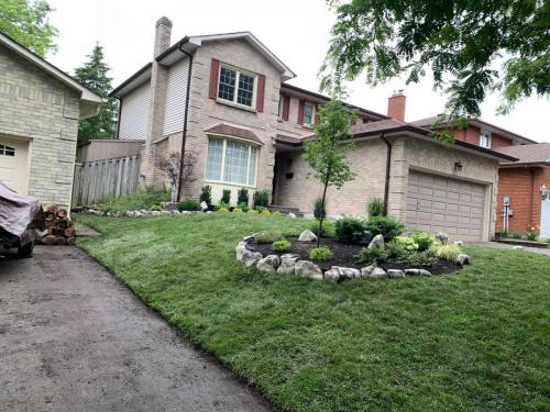 2021-Neighbours-completing-front-yard-sod-project-together-in-Whitby