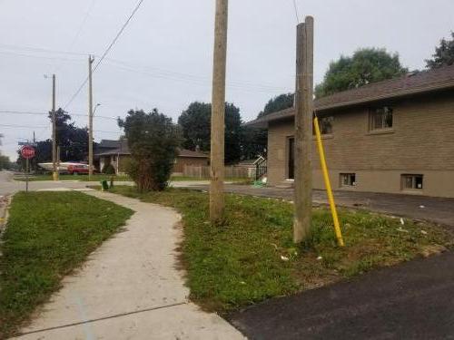 2021-t1-Before-large-scale-sod-project-at-the-side-of-a-newly-renovated-duplex-for-sale-in-Whitby