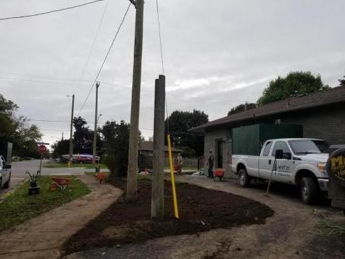 2021-t2-Working-on-a-large-scale-sod-project-at-the-side-of-a-newly-renovated-duplex-for-sale-in-Whitby