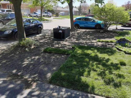 41 - Front yard sod laying after soil preparation