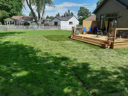 63 - Backyard sod install ajax blending in with existing lawn