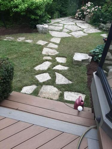 68 - Backyard sod with flag stone Ajax