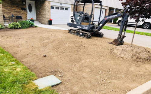 front entrance sod grading before 2